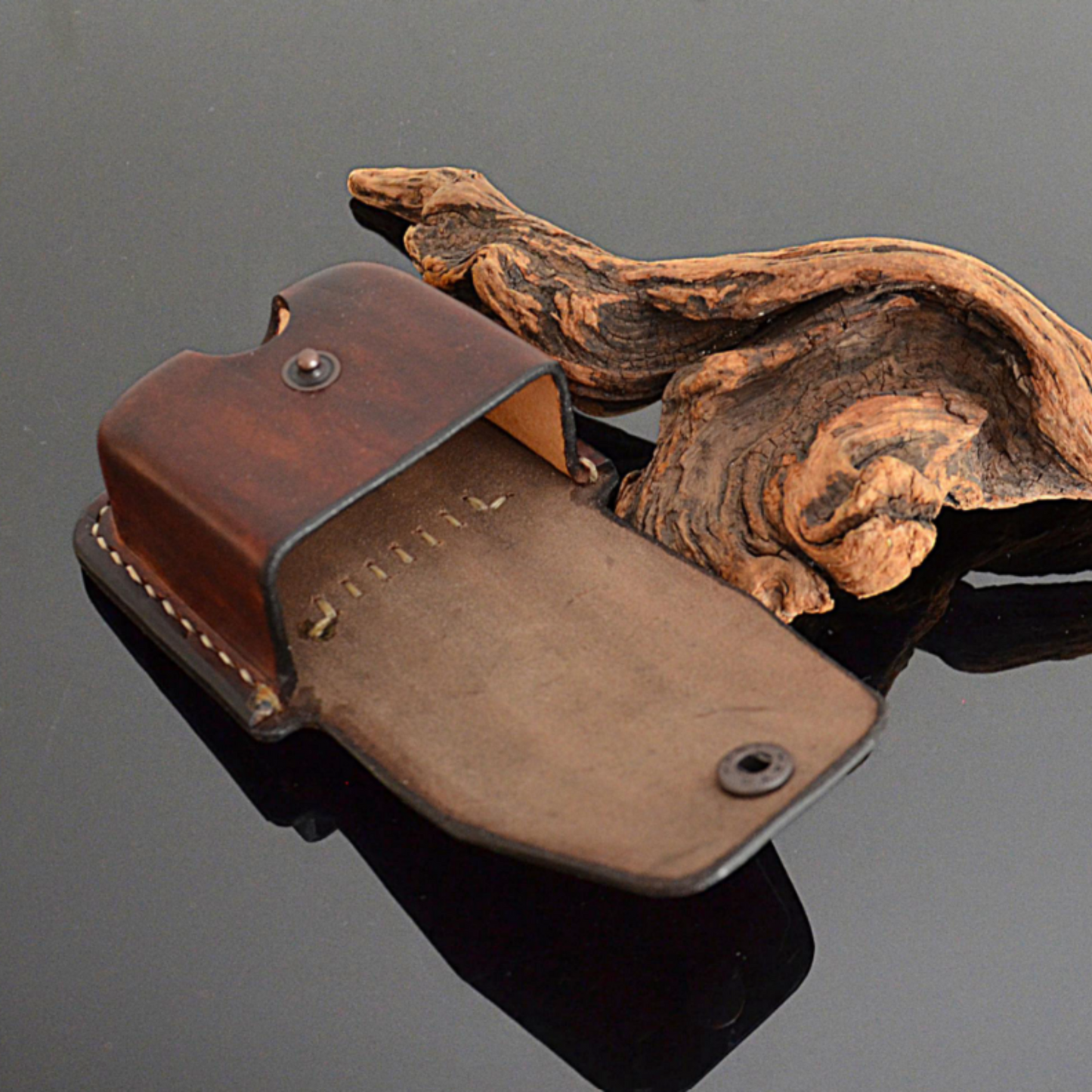 Interior of leather Powerbeats Pro 2 pouch showing precise fit and stitching