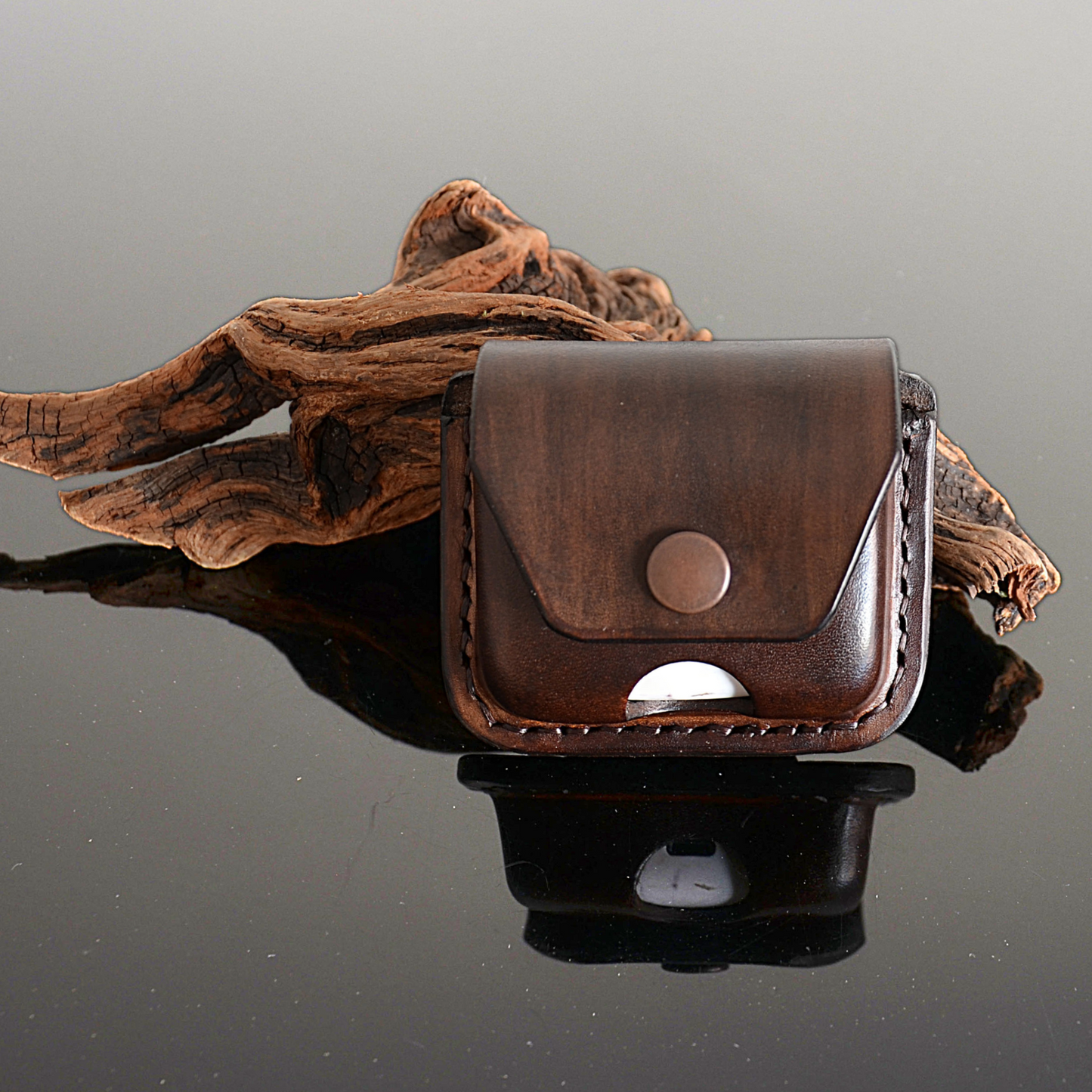 Handcrafted leather earbuds belt pouch in brown by EXODOS Copenhagen