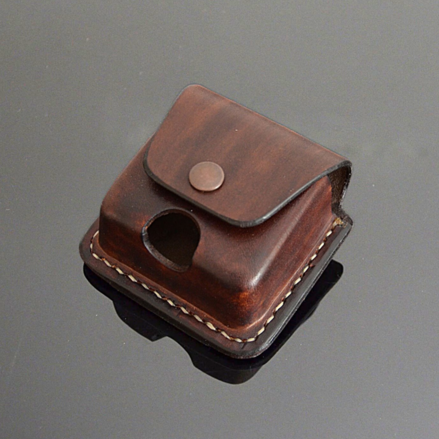 Handcrafted leather belt pouch in brown for Powerbeats Pro 2 by EXODOS Copenhagen